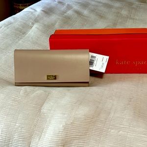 Brand new with tags and She is ready for her new home! Sleek style!